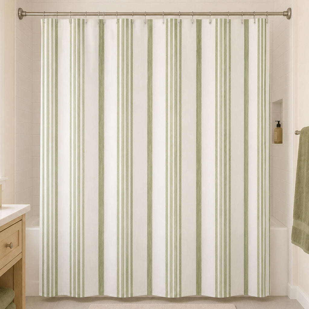 Sage ticking stripe shower curtain in a warm white tile guest bathroom with light maple and nickel finishes