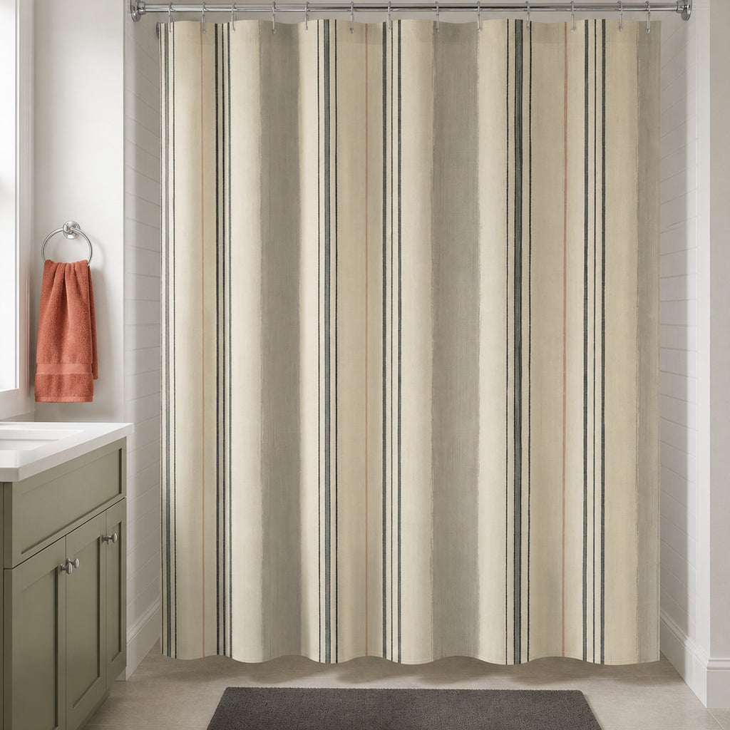 Black cream pinstripe shower curtain in a warm white bathroom with olive vanity and coral towel