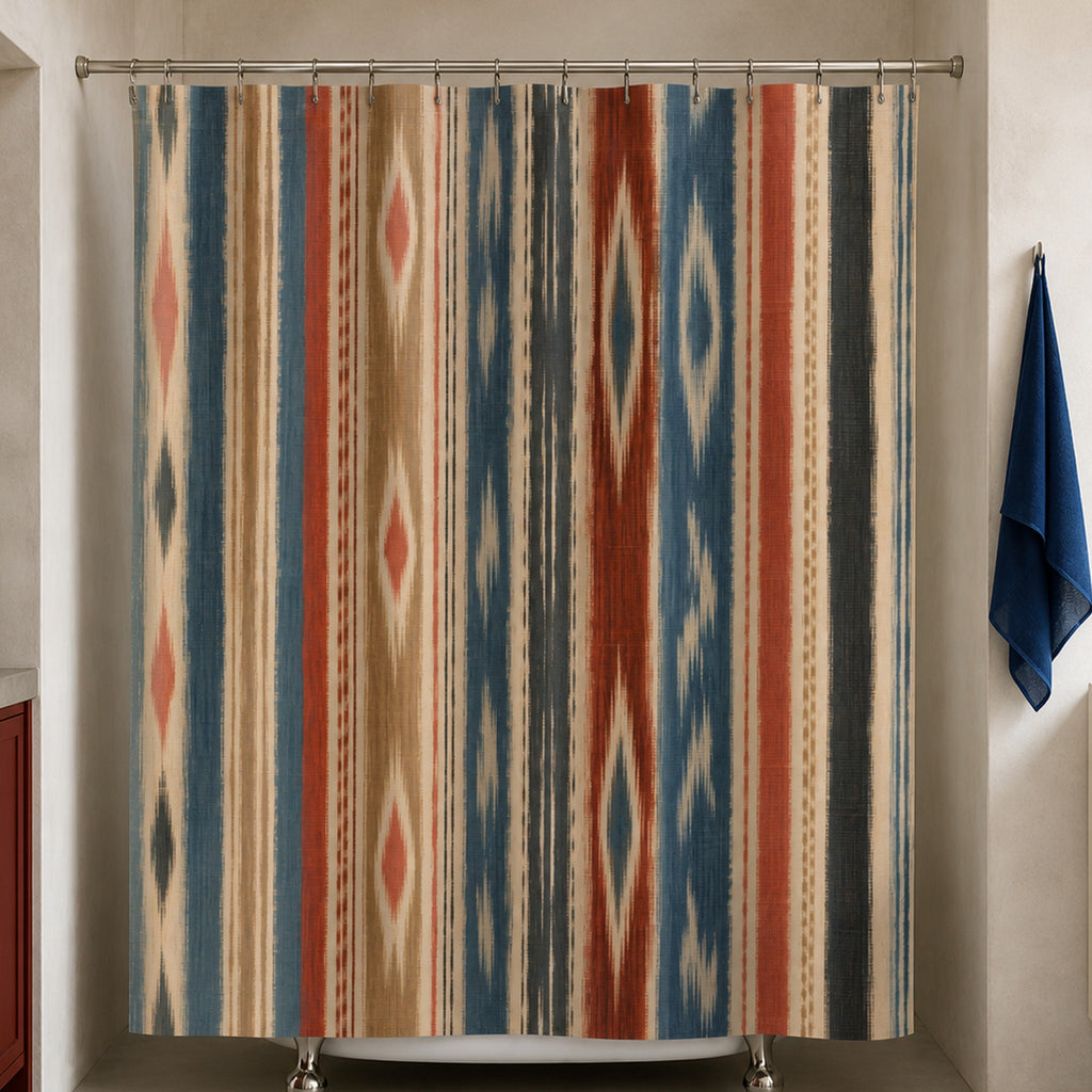 Terracotta and blue ikat stripe shower curtain in an earthy ceramicist-inspired bathroom