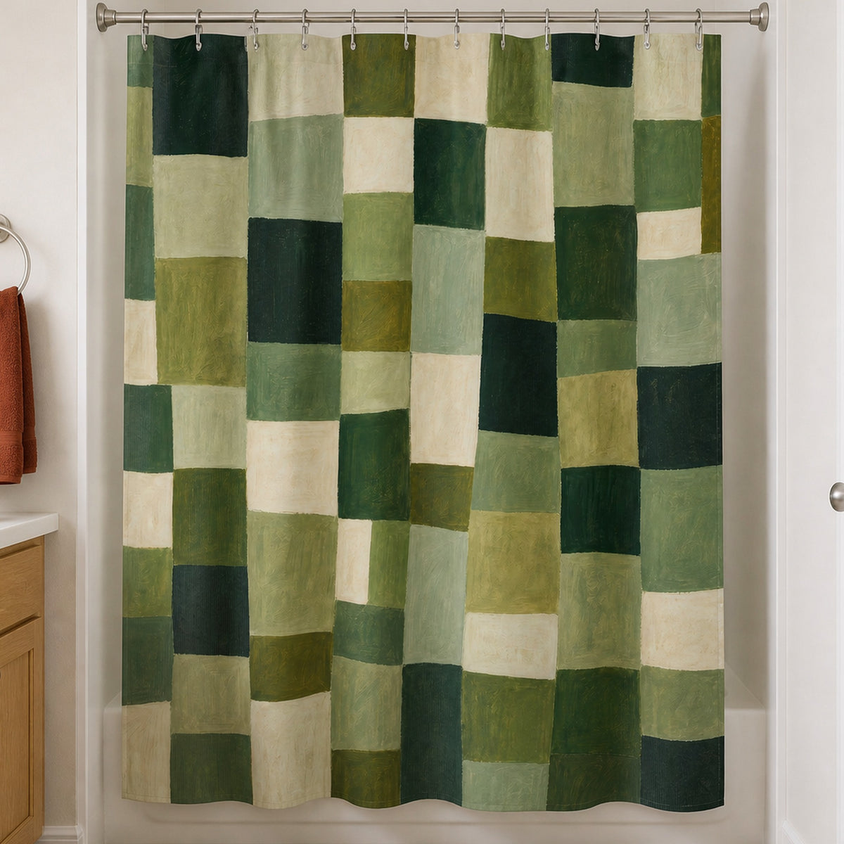 Olive cream patchwork check shower curtain in a warm-white guest bathroom with oak vanity and rust towel