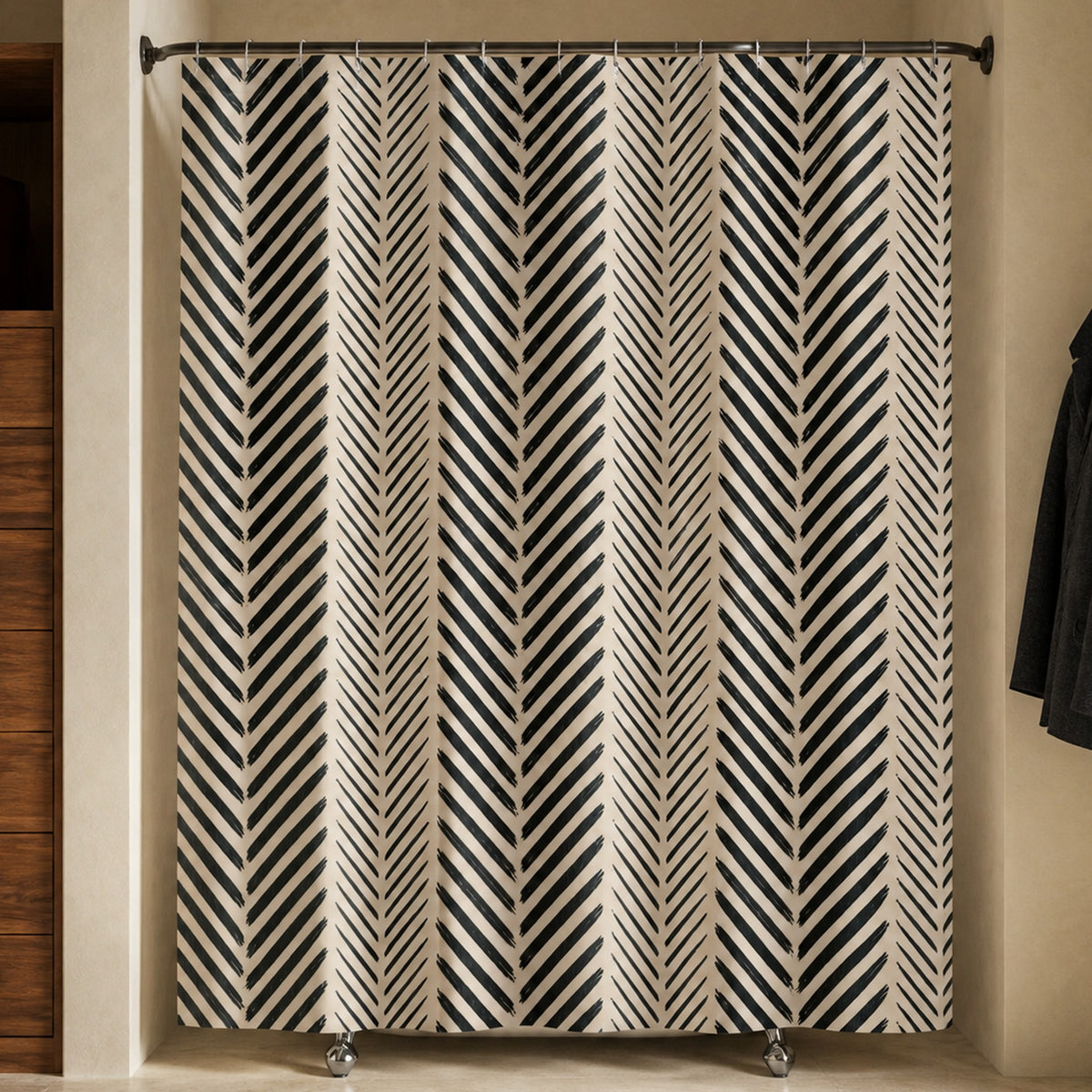 Black cream chevron shower curtain in a tailor inspired bathroom with walnut drawers and charcoal jacket
