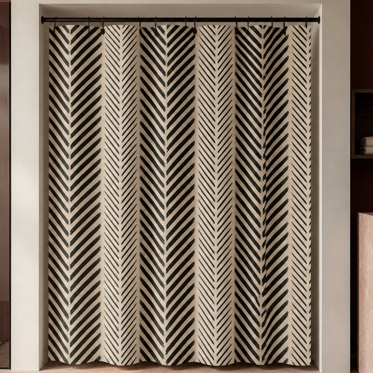 Black cream chevron shower curtain in a luxury bathroom with oxblood lacquer, rose stone and smoked glass