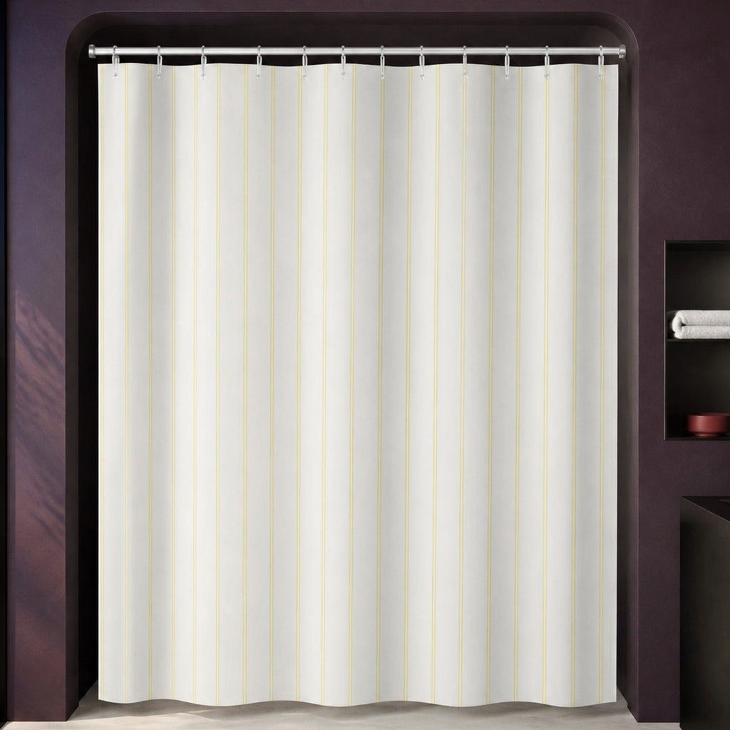 Pale yellow pinstripe shower curtain in a luxury aubergine bathroom with cobalt glass and blackened steel