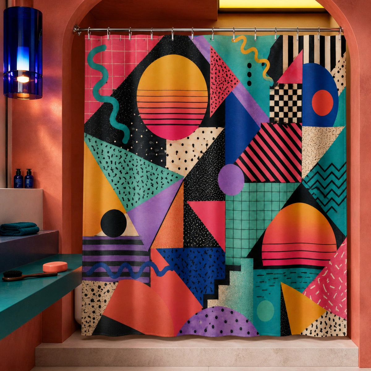 Colorful Memphis geometric shower curtain in a coral postmodern designer bathroom with cobalt glass
