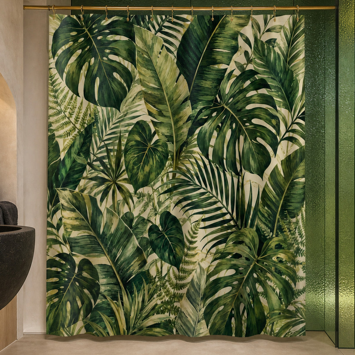 Green tropical leaf shower curtain in a luxury emerald glass bathroom with chartreuse light and black basalt