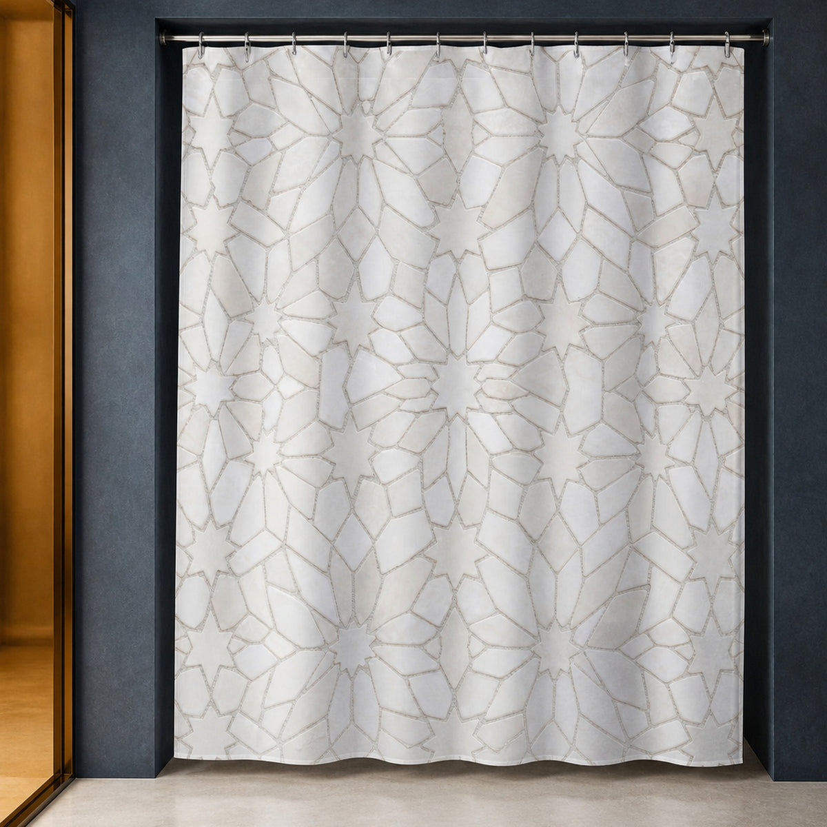 White Moroccan star tile shower curtain in a luxury ink blue bathroom with amber glass and pale limestone