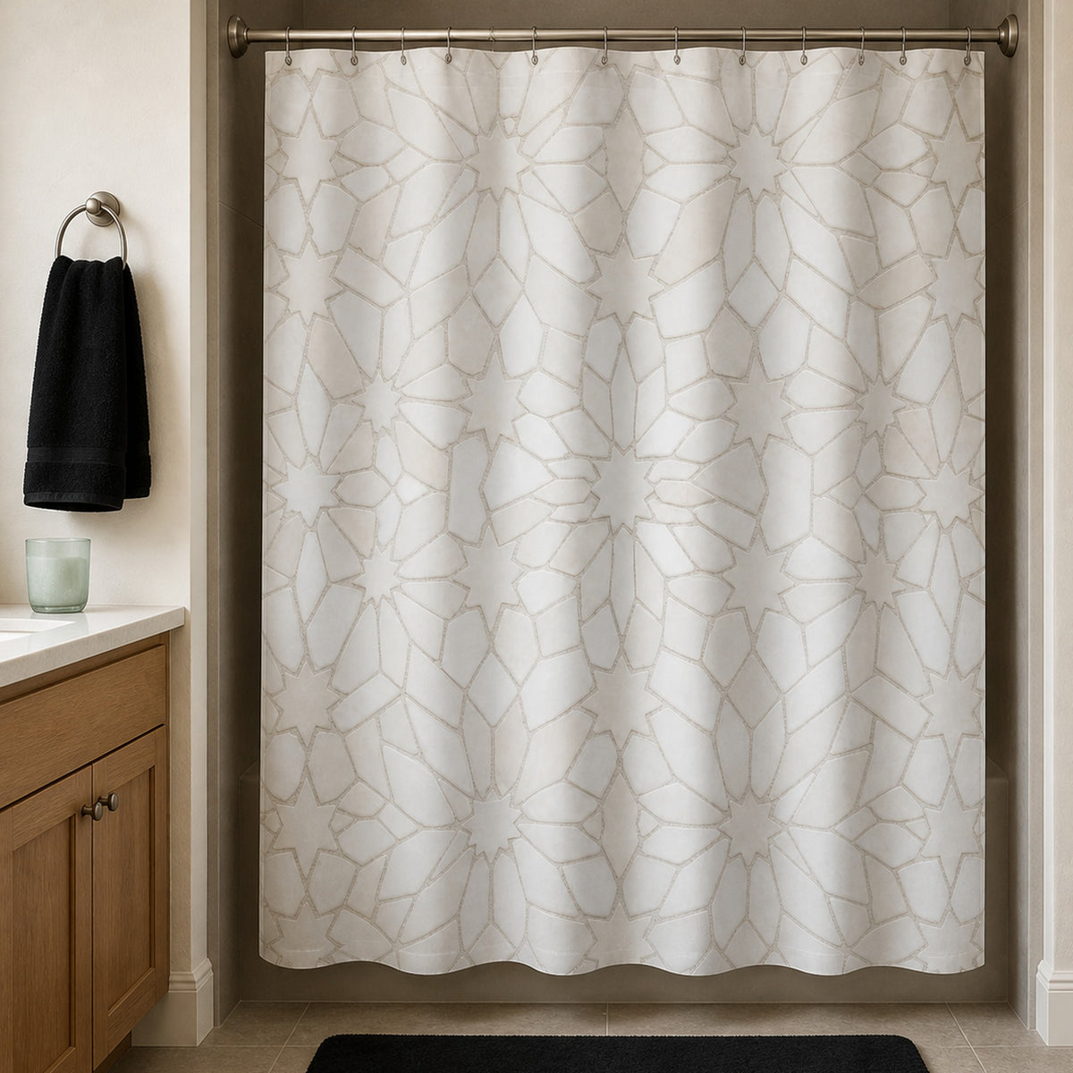 White Moroccan star tile shower curtain in a mushroom guest bathroom with oak vanity and black towel
